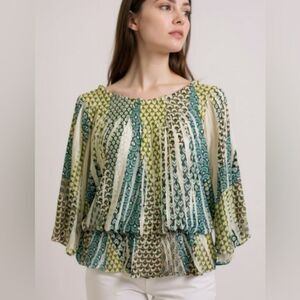 Cute Yellow and green blouse. Elastic neckline and in the middle. Size 14/16